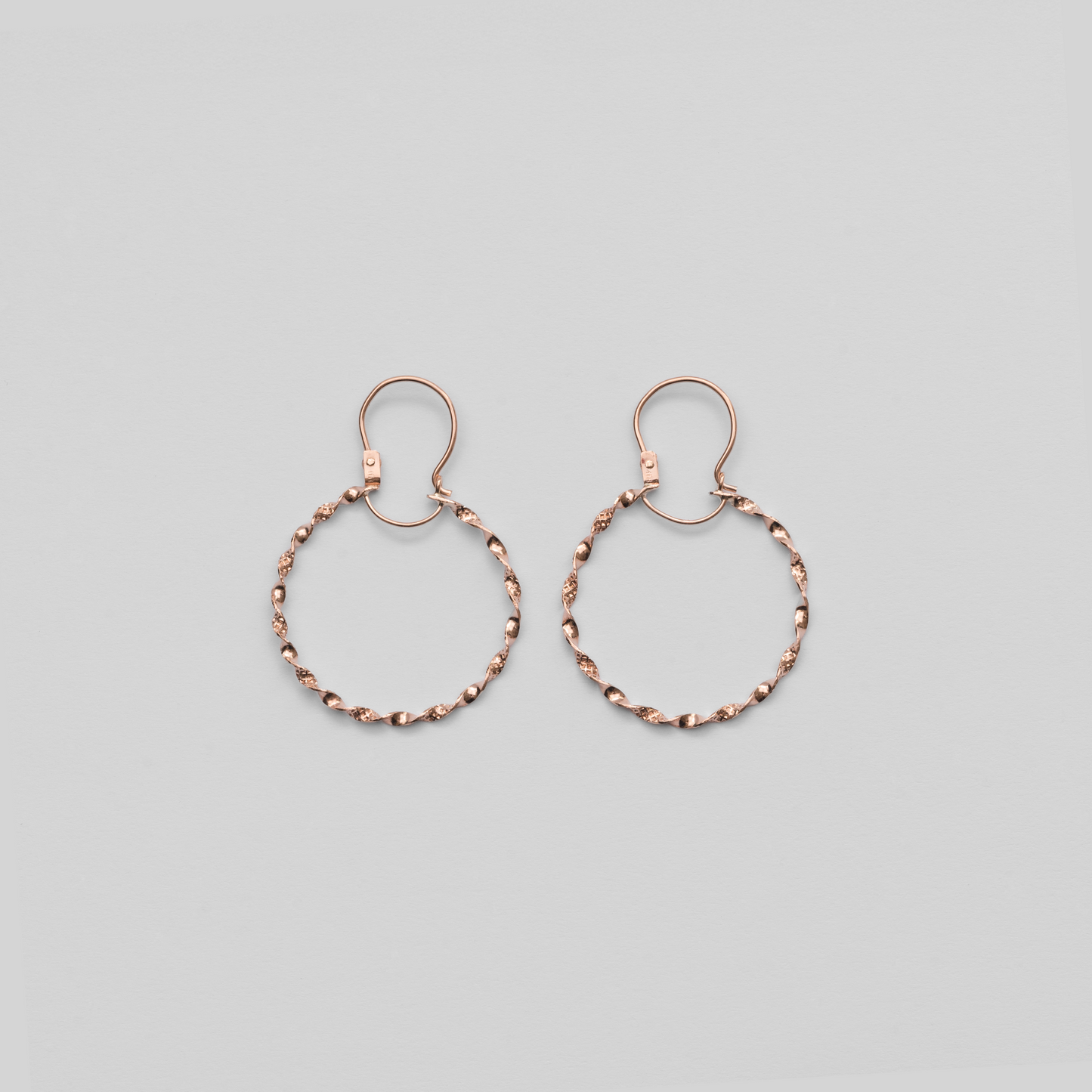 Aros Entorchados 2 en Oro Rosado 18K