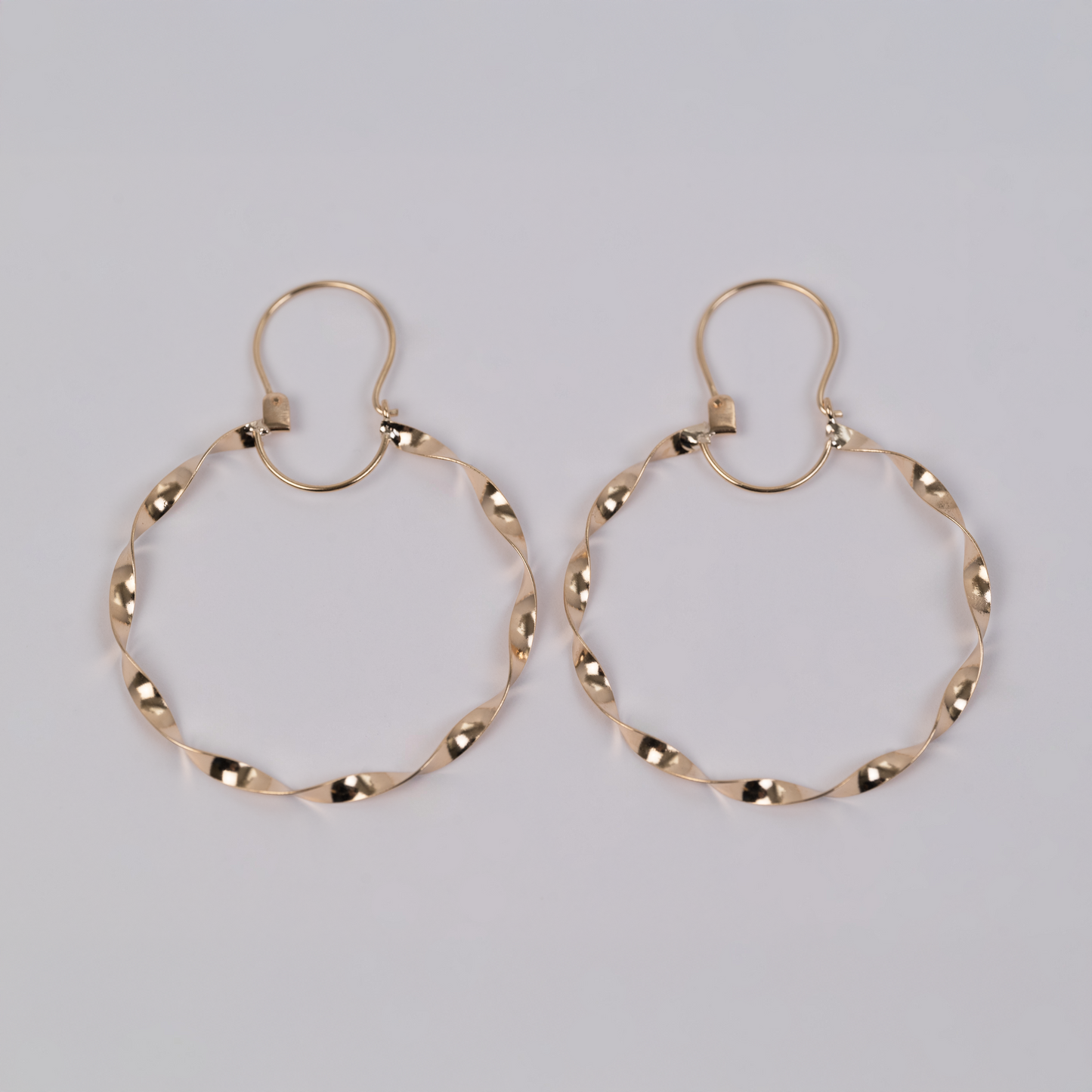 Aros Entorchados con gancho Oro 18K
