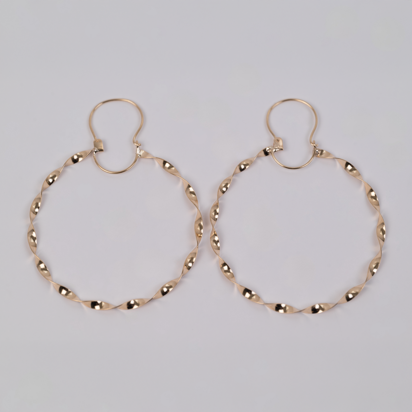 Aros Entorchados con gancho Oro 18K