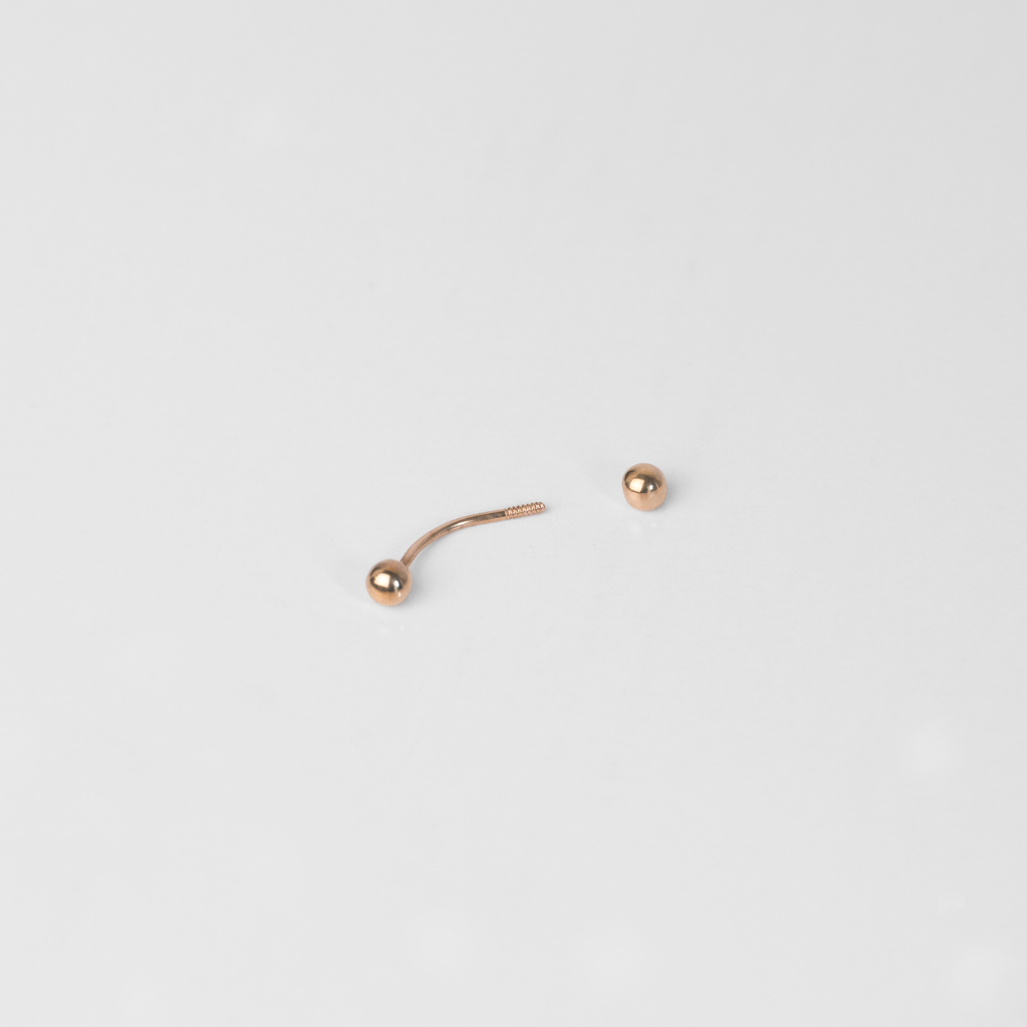 Piercing Banano Oro Rosado 18K