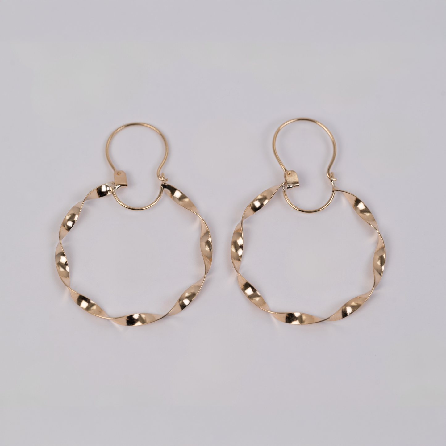 Aros Entorchados con gancho Oro 18K