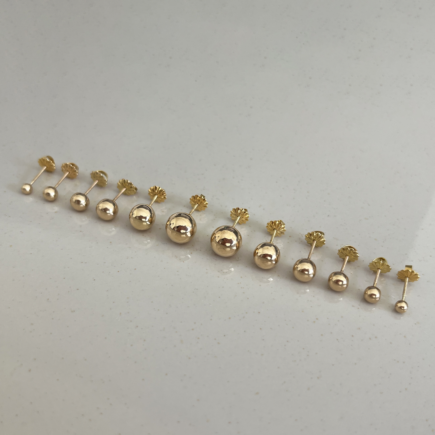 Aros bolita Oro Rosado 18K