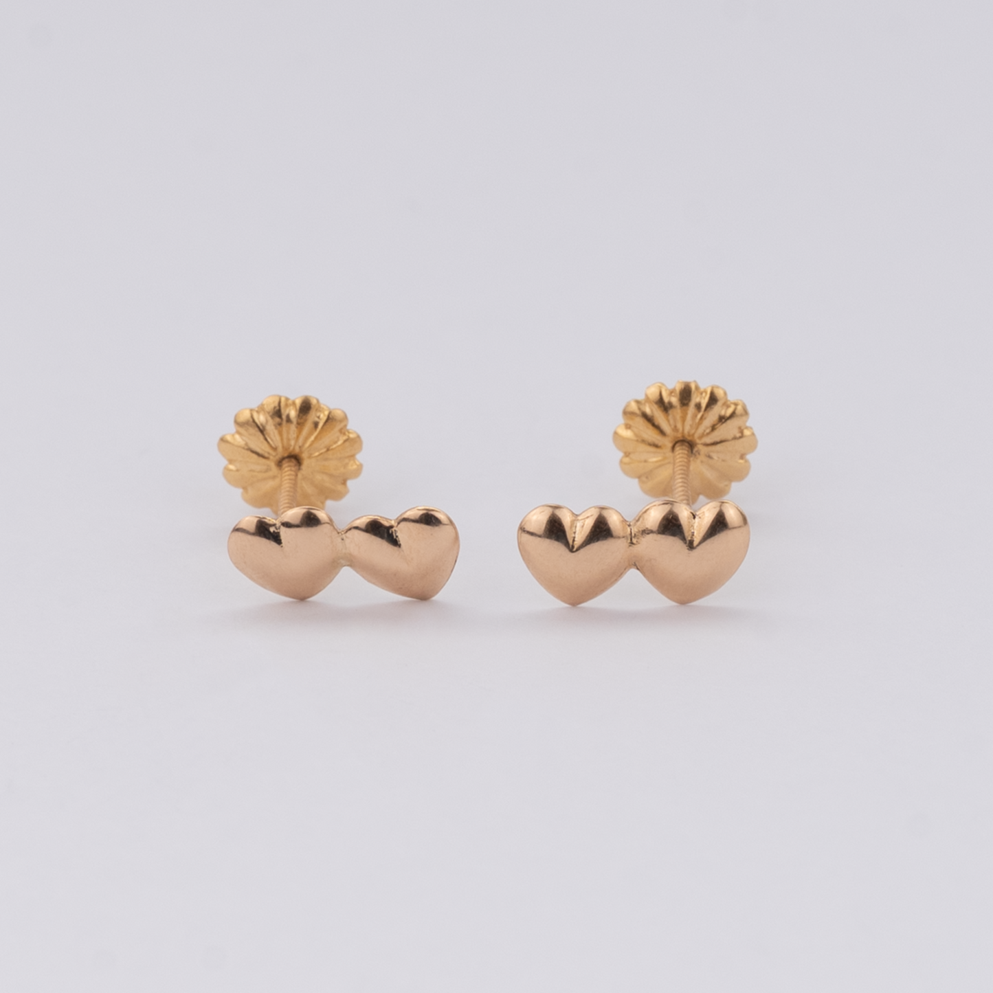 Aros Doble Corazón Oro Rosado 18K