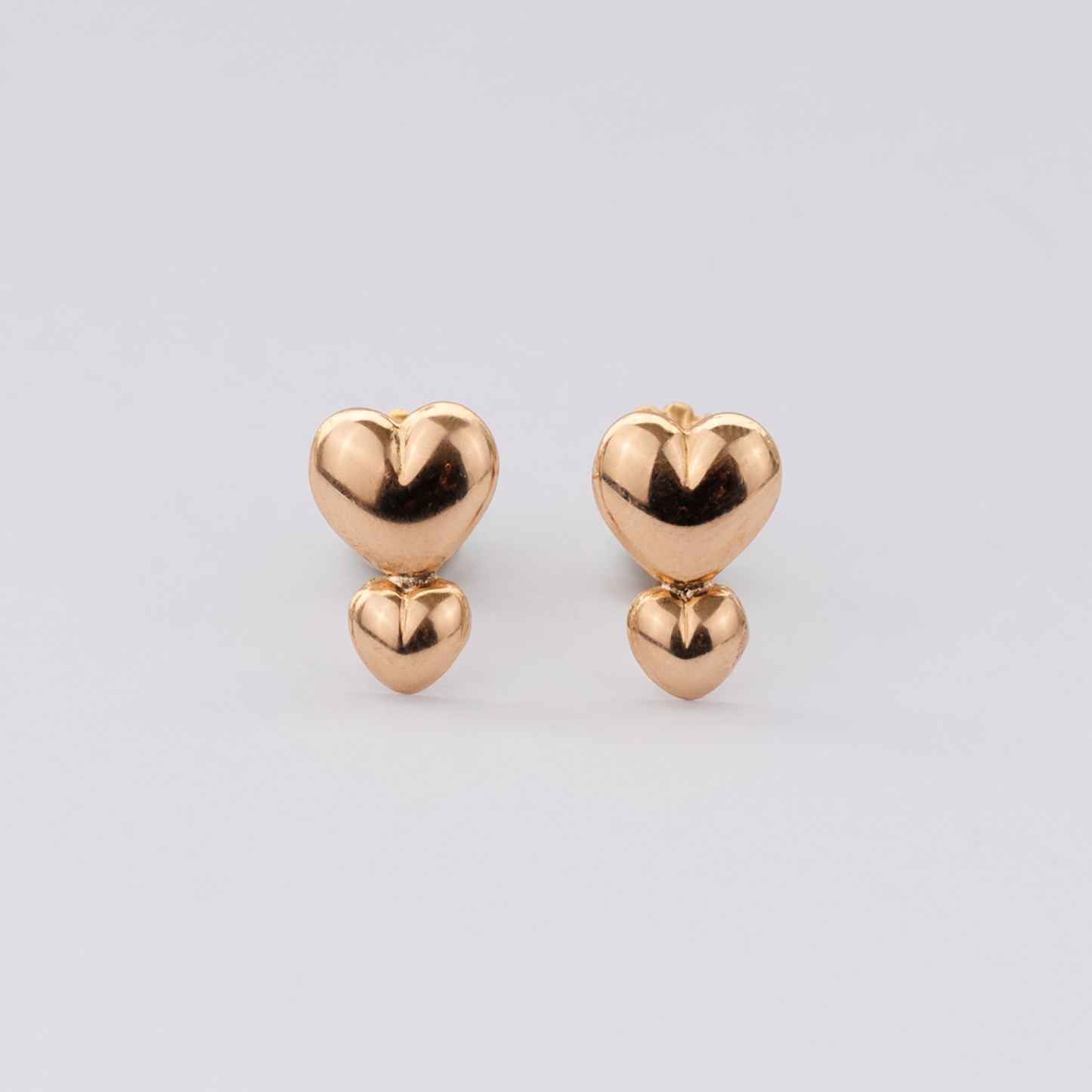 Aros Doble Corazón Vertical Oro Rosado 18K