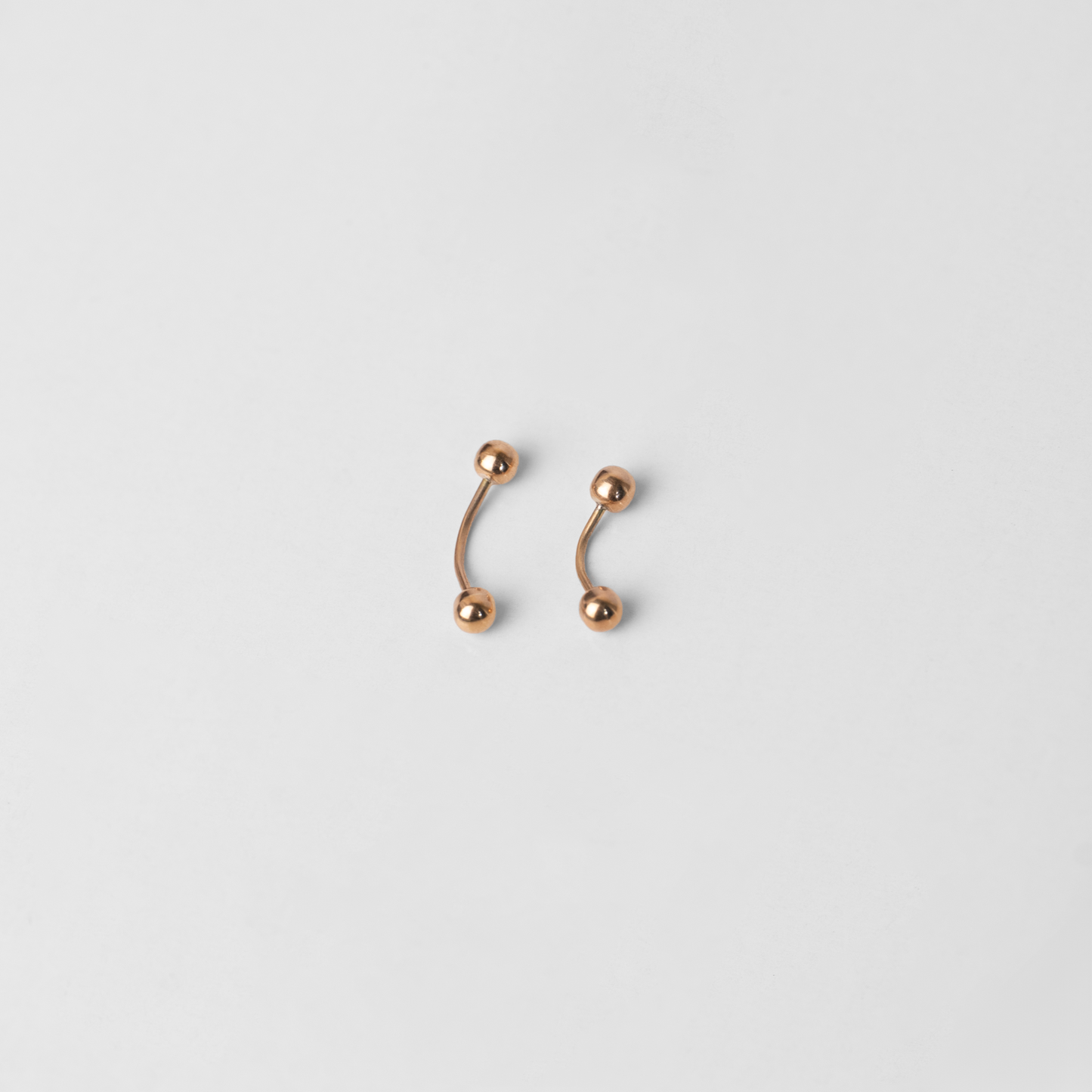 Piercing Banano Oro Rosado 18K