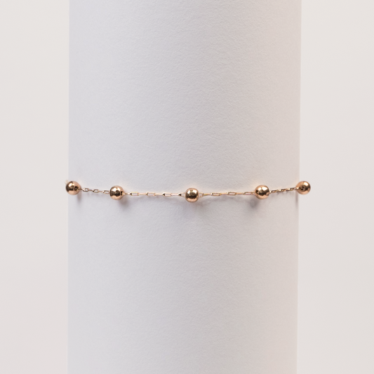 Pulsera Limada con Bolitas Oro Rosado 18K