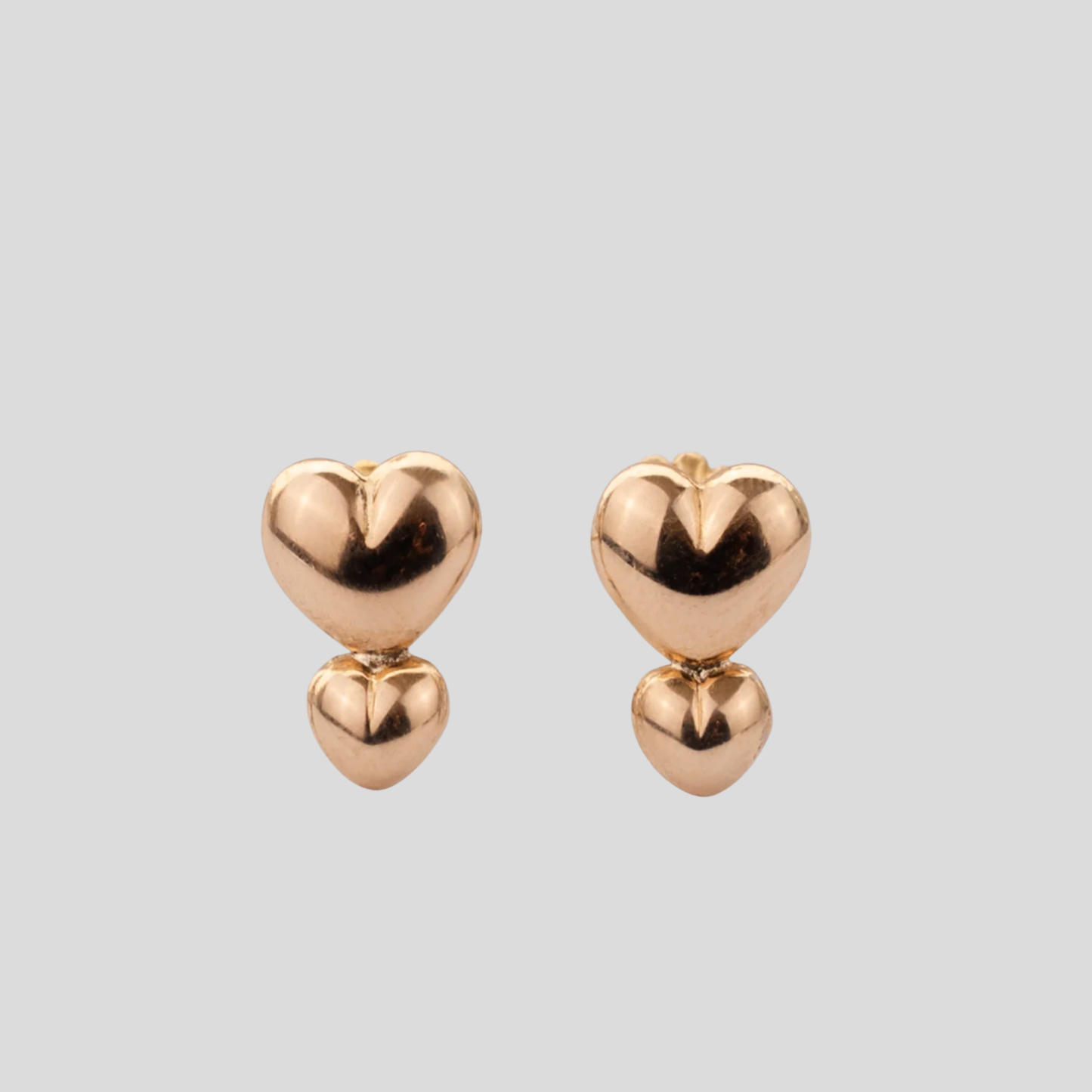 Aros Doble Corazón Vertical Oro Rosado 18K