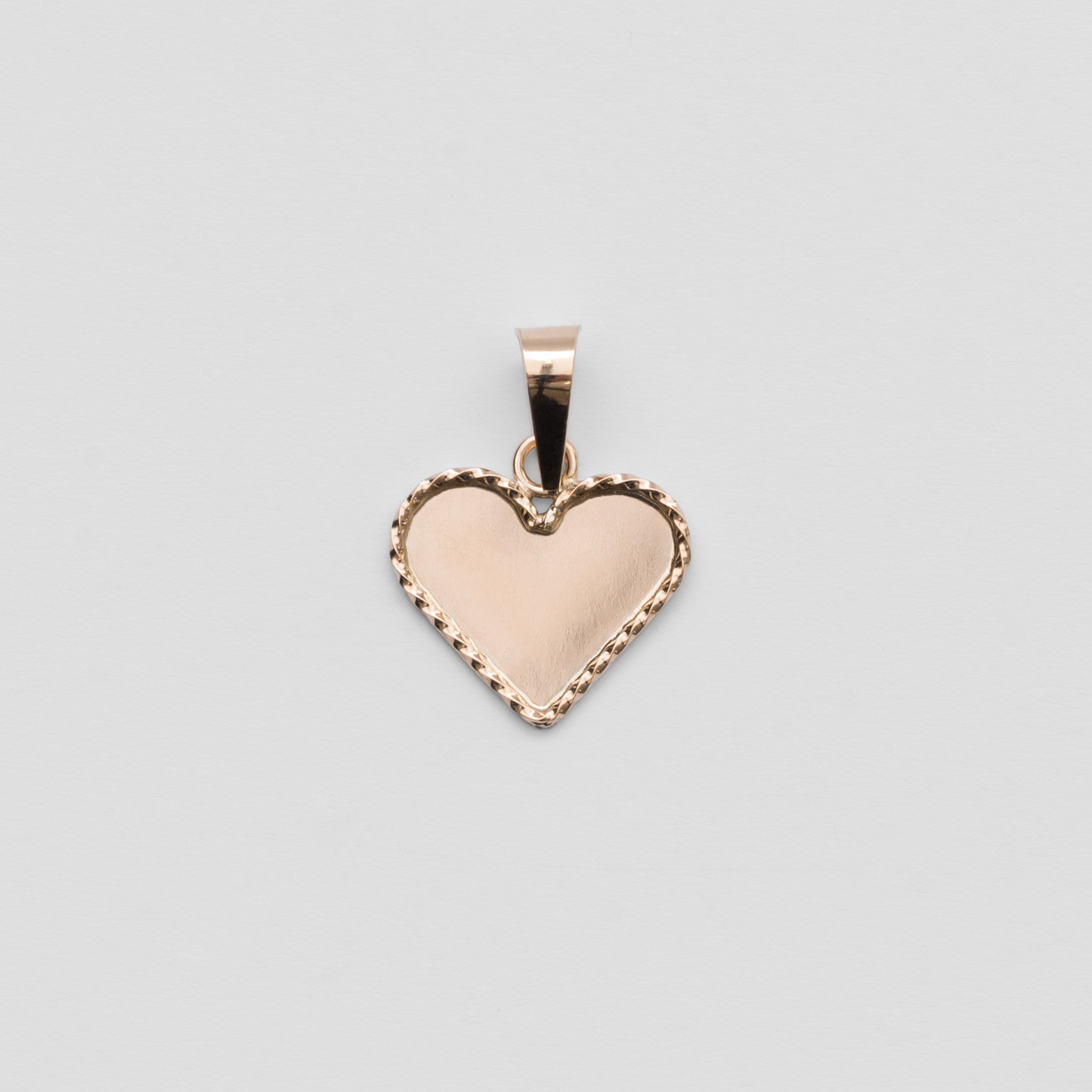 Dije Corazón en Oro Rosado 18K