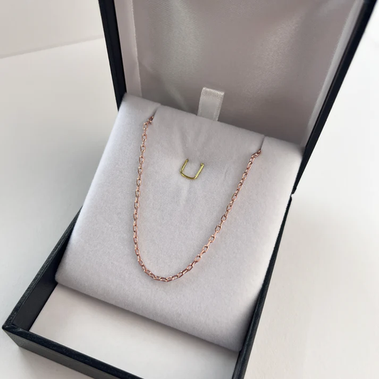 Dije Perfil Cristo Oro Rosado 18K