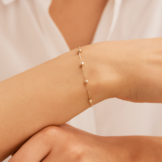 Pulsera Limada con Bolitas Oro Rosado 18K