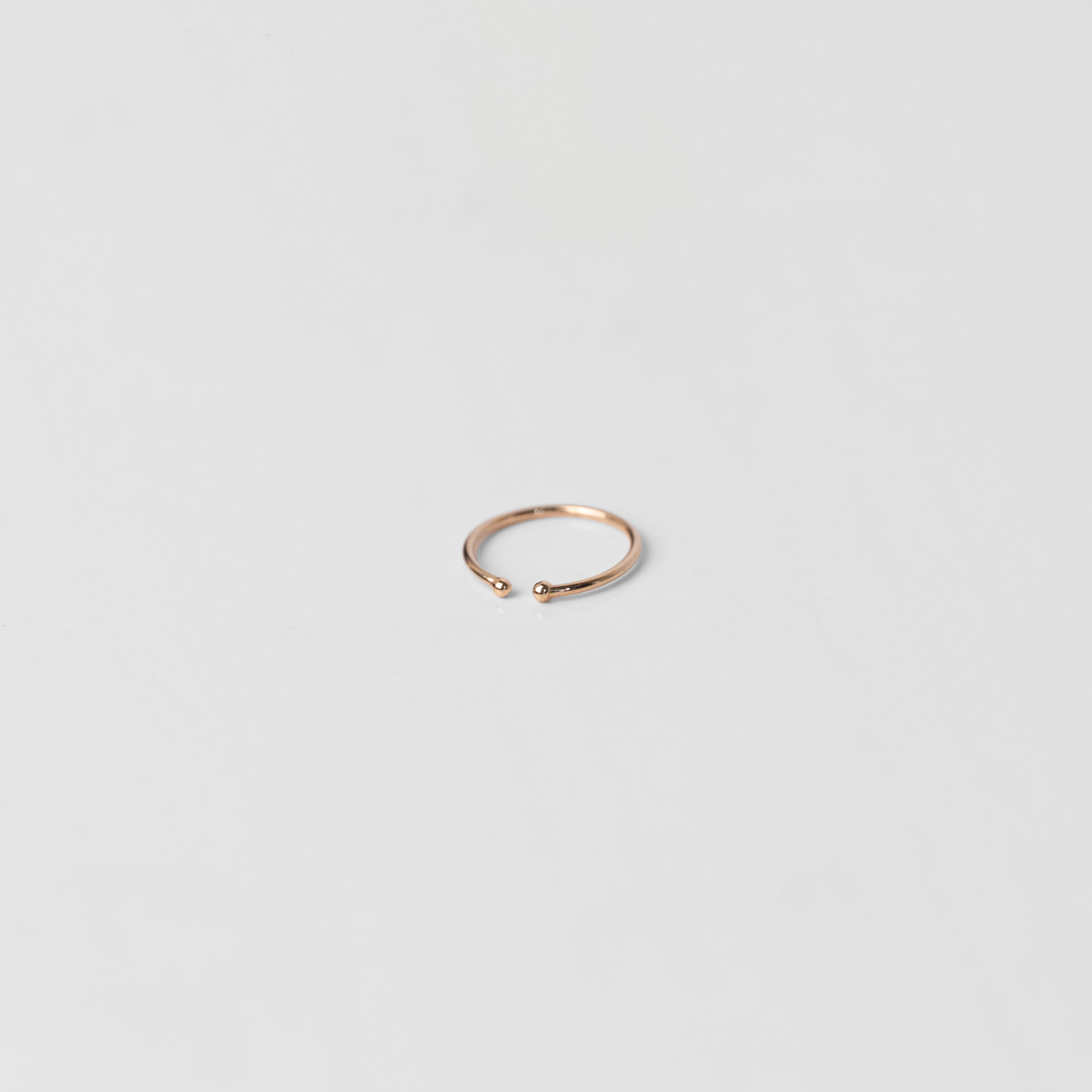 Piercing Aro Abierto con Bolita en Oro Rosado 18k