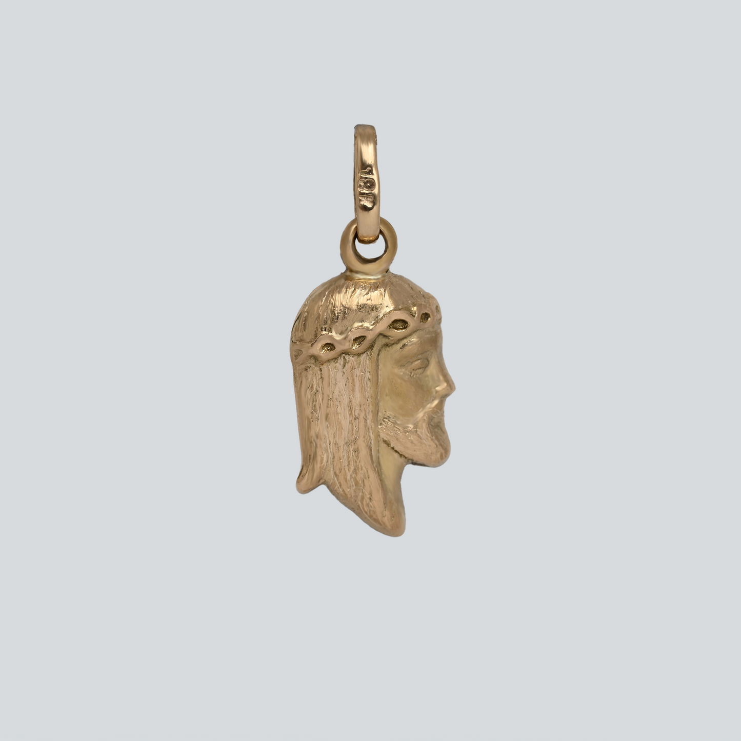 Dije Perfil Cristo Oro Rosado 18K