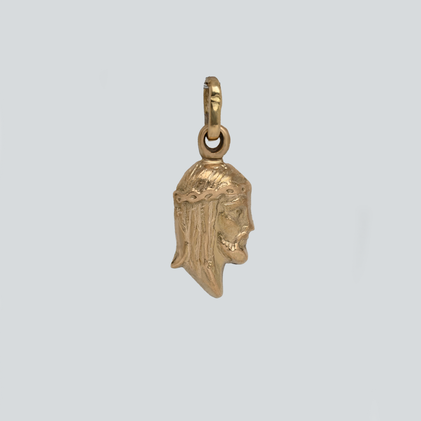 Dije Perfil Cristo Oro Rosado 18K
